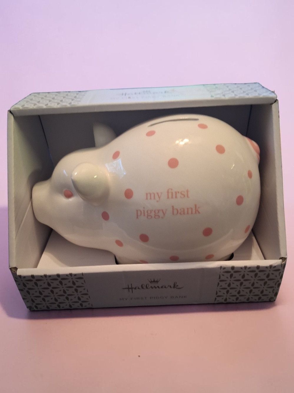 Hallmark Baby Keepsake white ceramic piggy bank featuring pink polka dots
